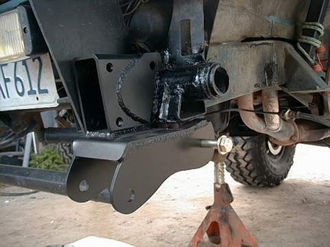 Insert the four steel bushings into the front upper shackle mounts on ...