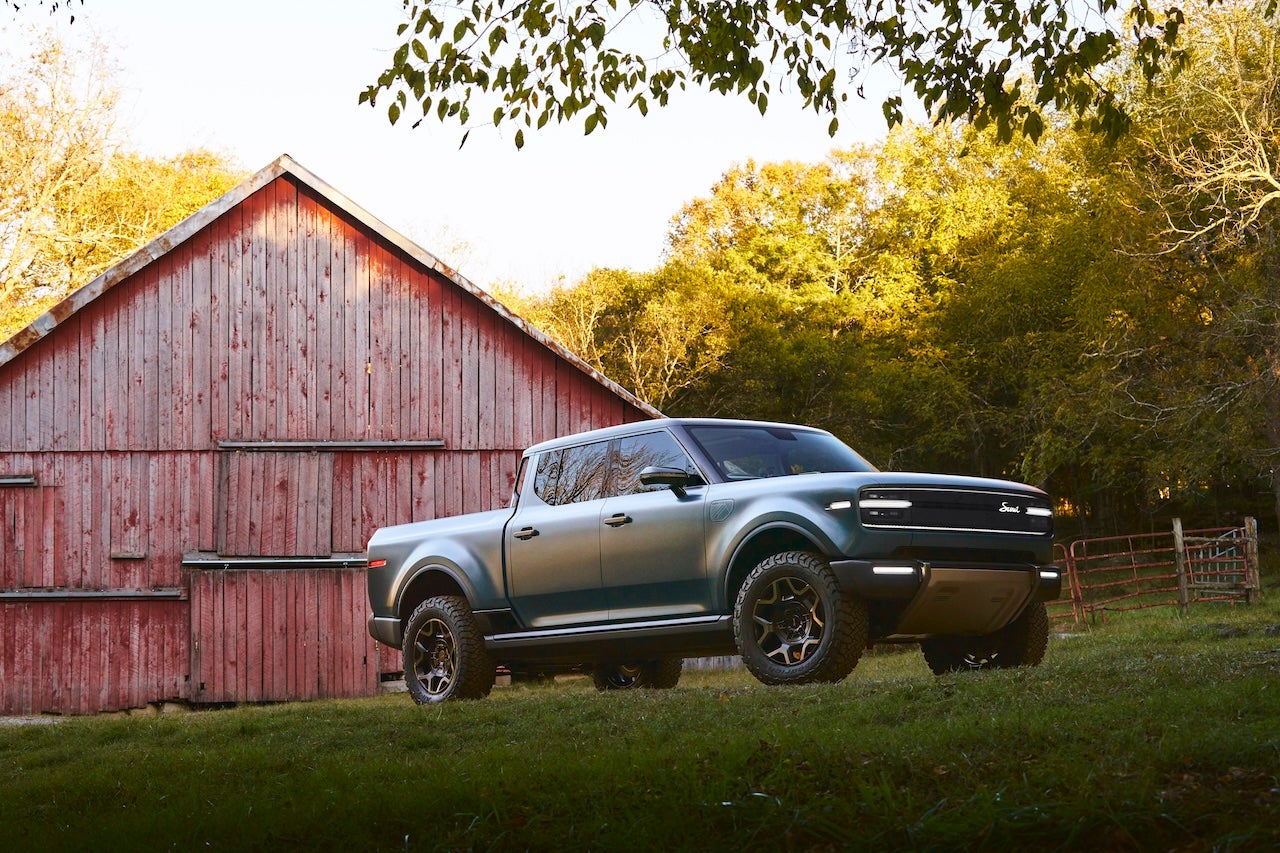 The Scout Terra is built for versatility, equipped with a powerful 240V outlet in the truck bed for job site or outdoor power needs. Credit: Scout Motors