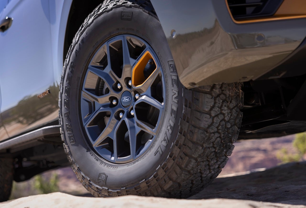 The 2025 Ford Expedition Tremor tackles rugged terrain with 33-inch General Grabber all-terrain tires and 10.6 inches of ground clearance. Credit: Ford Motor Company