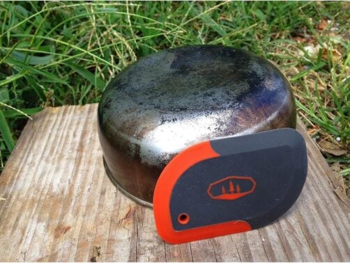 This compact, lightweight dual-sided pot scraper makes camp clean-up easy. Credit: GSI Outdoors