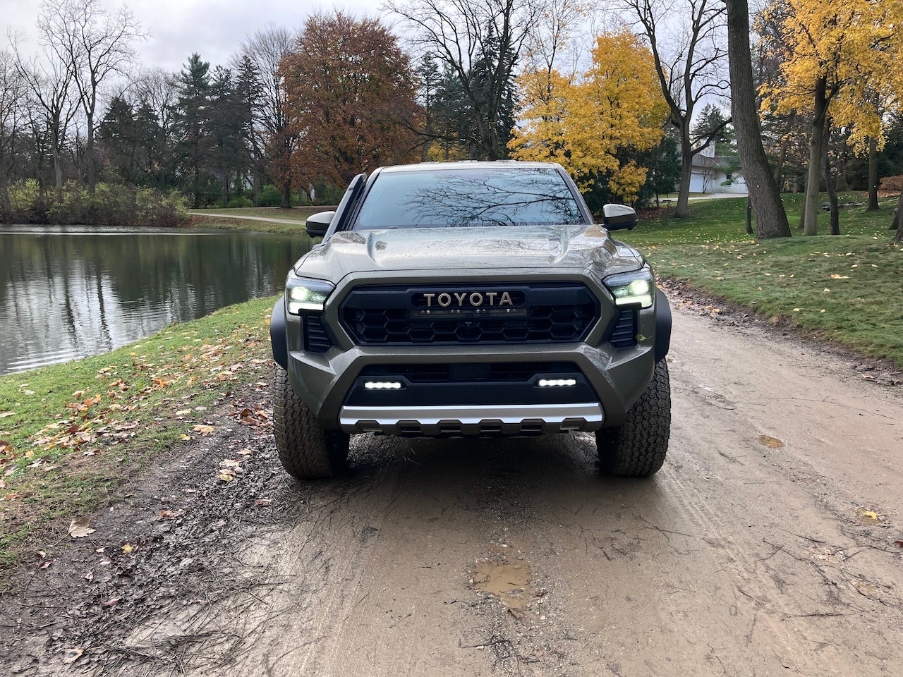 The iconic TOYOTA grille design gets a modern twist, complete with an LED light bar and fog lamps to light the way. Credit: Greg Migliore