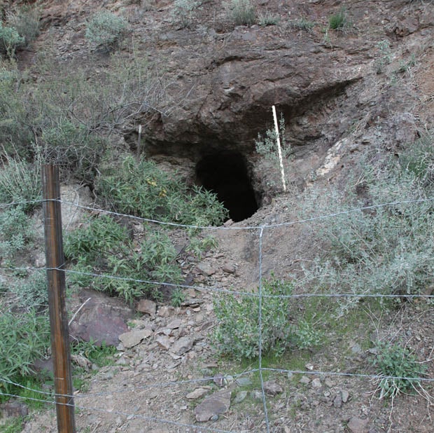 This fenced-off mine adit hinted at what else lay in the area, giving us an incentive to return another time.