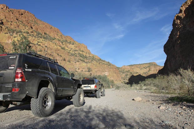 Box Canyon Road parts ways with Price Road, and soon thereafter enters BLM land. The afternoon shadows loomed large.