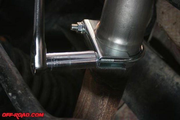 Again using the 15mm deep socket, tighten the clamp. Do not overtighten these nuts or you may deform the pipes.