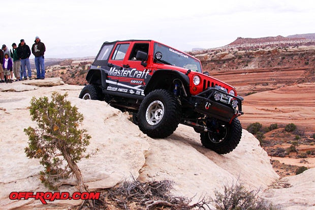 Robbie Pierce coming out of the tub and getting dried off by the high winds shooting up the cliffs in Moab.